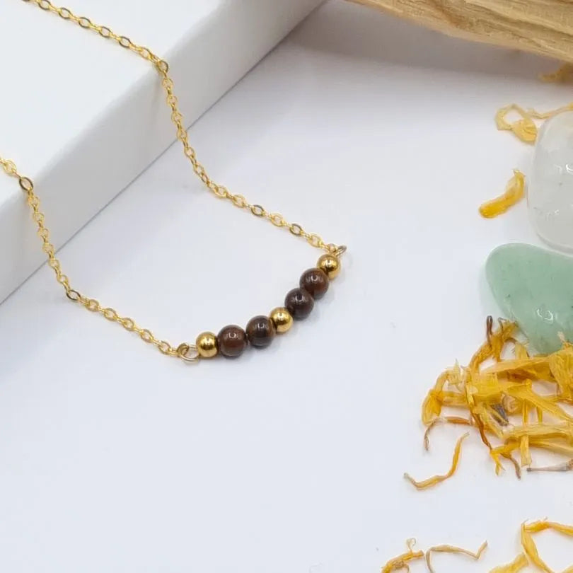 Collier Oeil de Tigre 4mm doré 18k