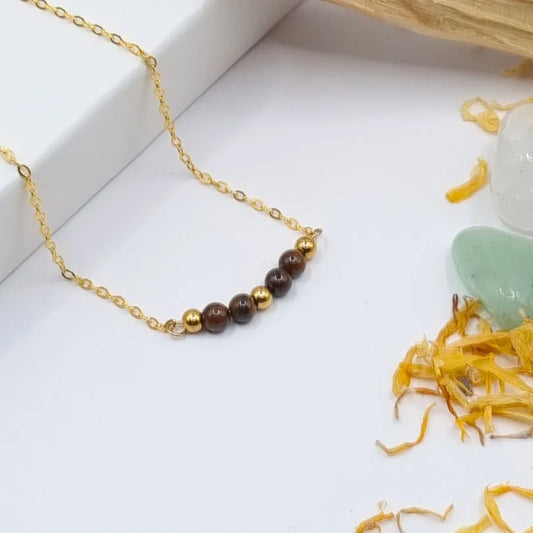 Collier Oeil de Tigre 4mm doré 18k