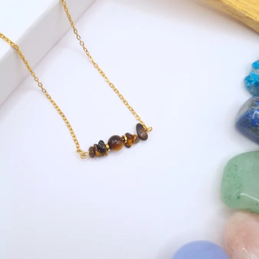 Collier oeil de tigre chaine dorée mi-long