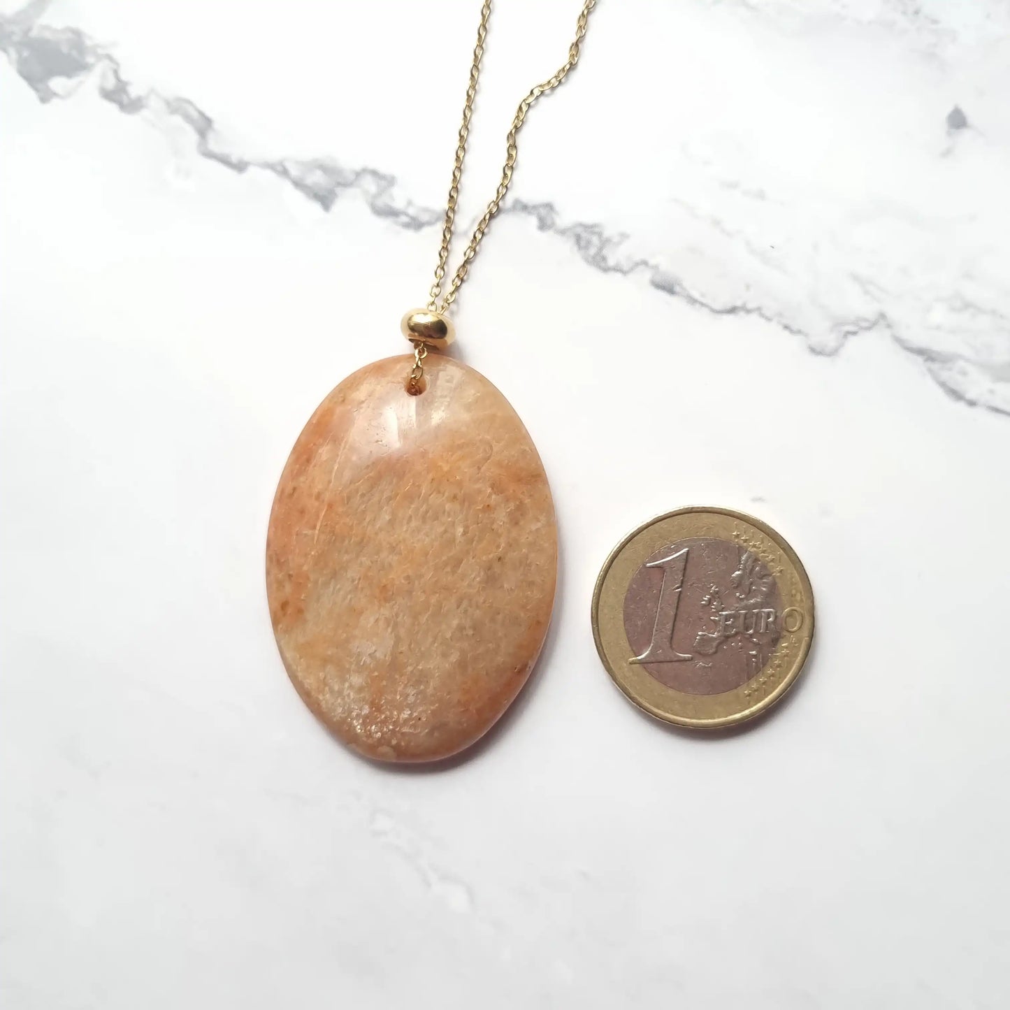 taille pendentif pierre du soleil oval MystikBox